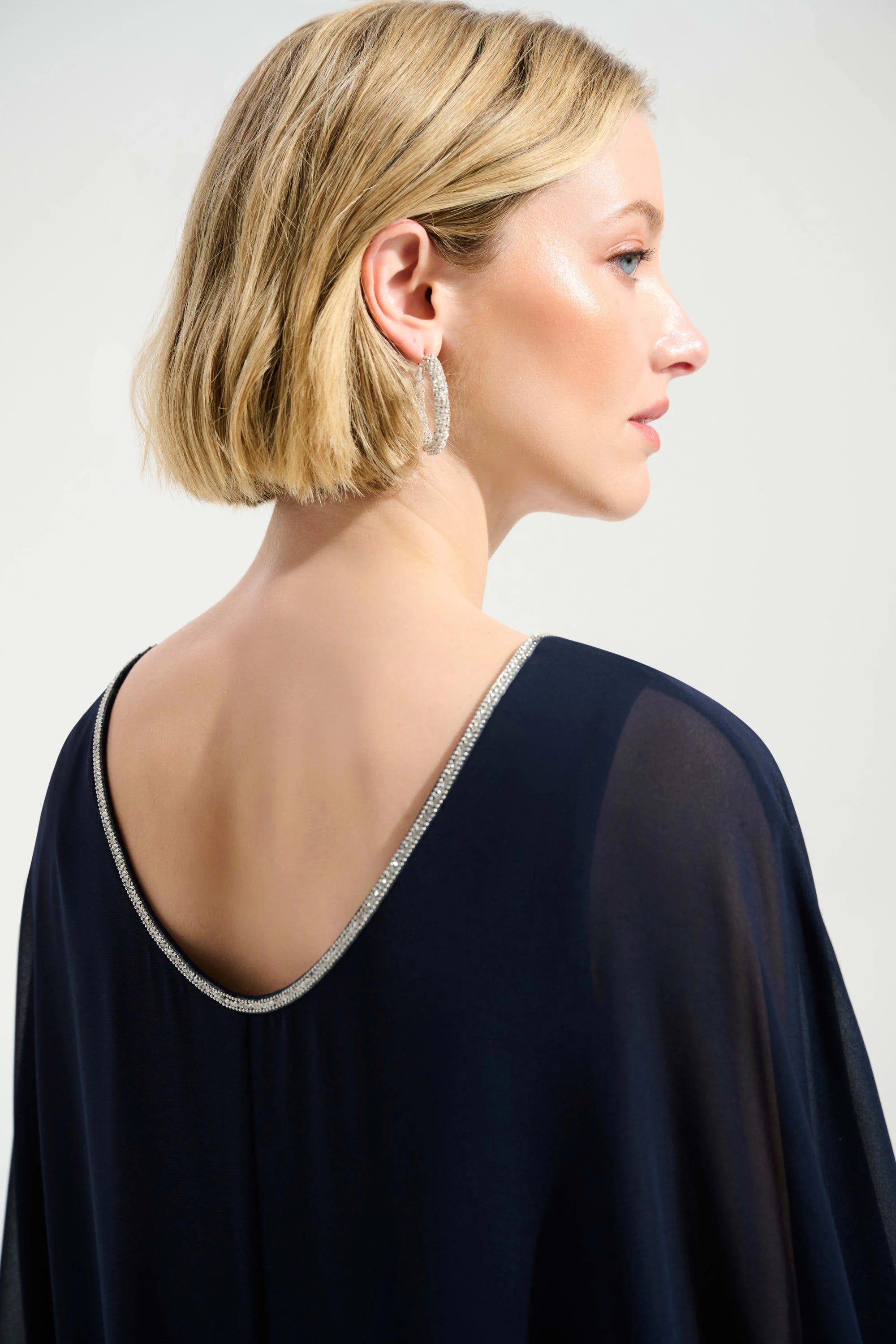 Cascade Knit Sheath Dress With Chiffon Poncho Overlay in Navy 261707