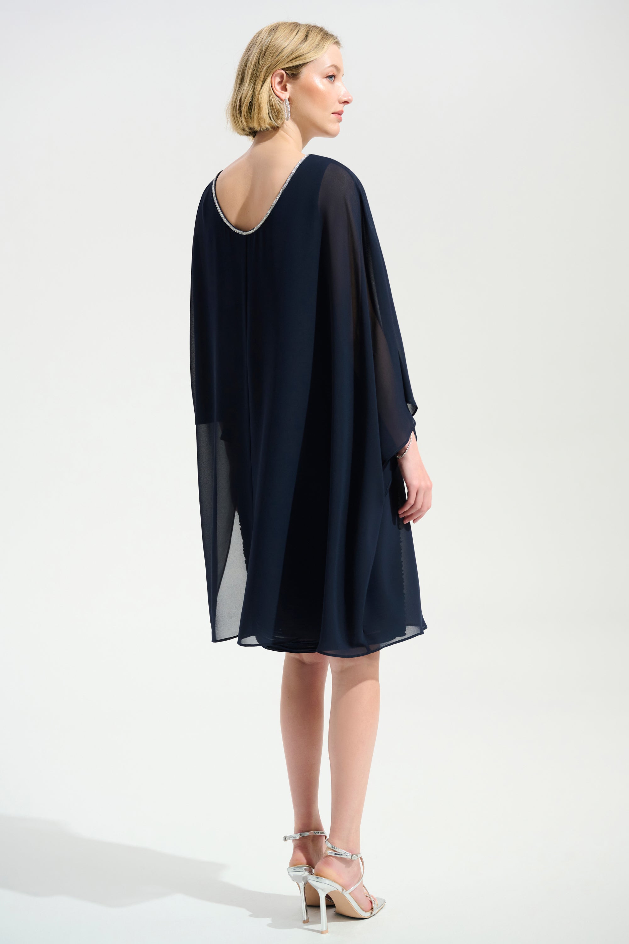 Cascade Knit Sheath Dress With Chiffon Poncho Overlay in Navy 261707